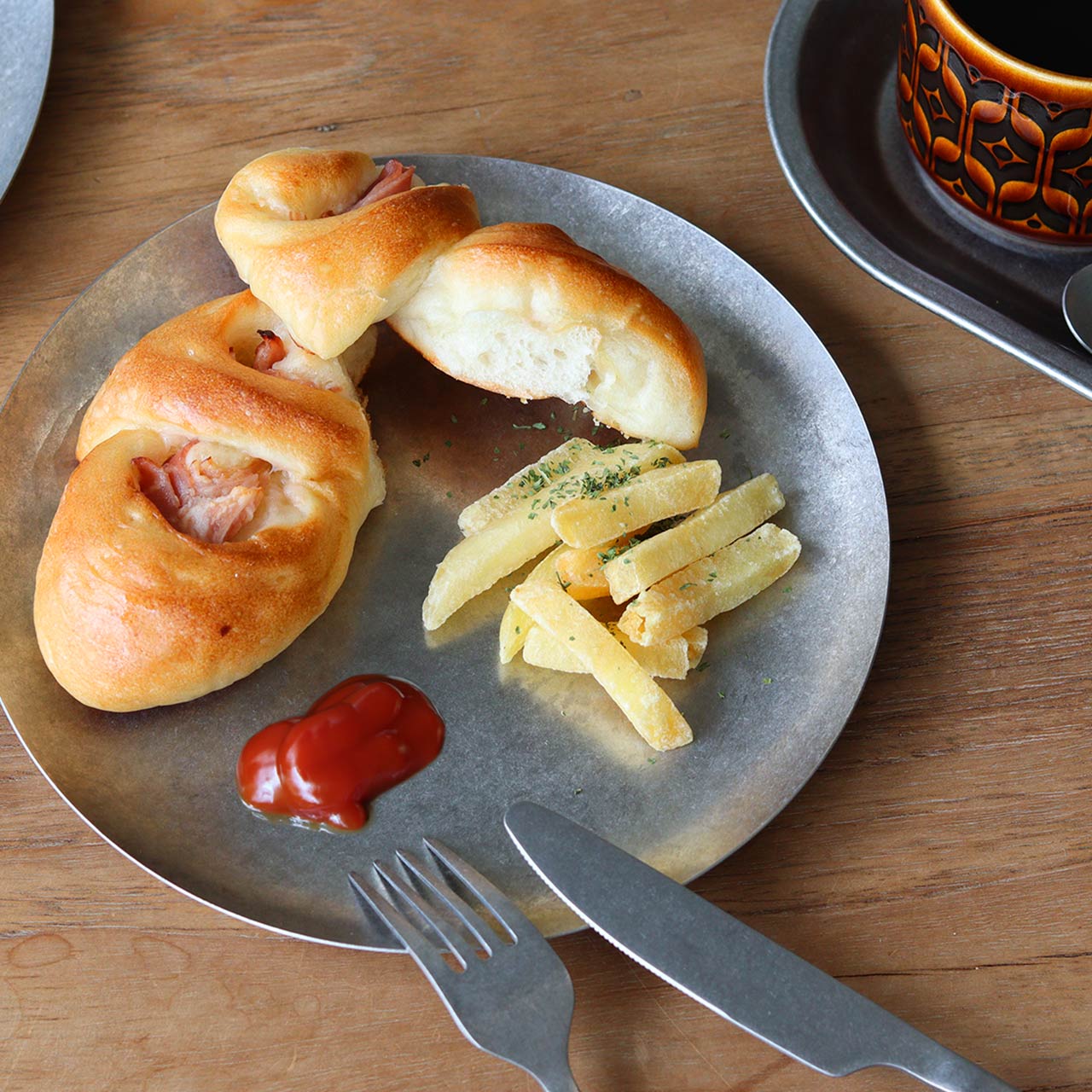 Assiette en inox 23cm diam.